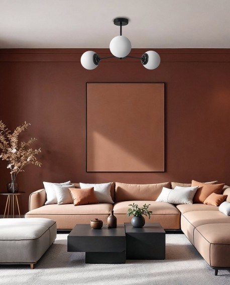 Lampa wisząca z trzema kulistymi kloszami z mlecznego szkła na czarnym stelażu, idealna do minimalistycznych wnętrz.