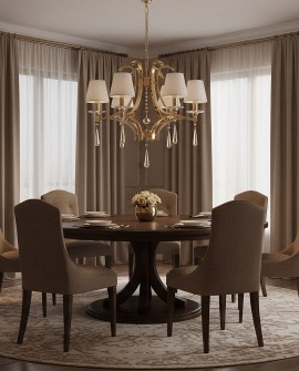 Elegancki złoty żyrandol kryształowy Venisia W6 w klasycznym stylu, zawieszony nad okrągłym stołem w jadalni w odcieniach beżu.