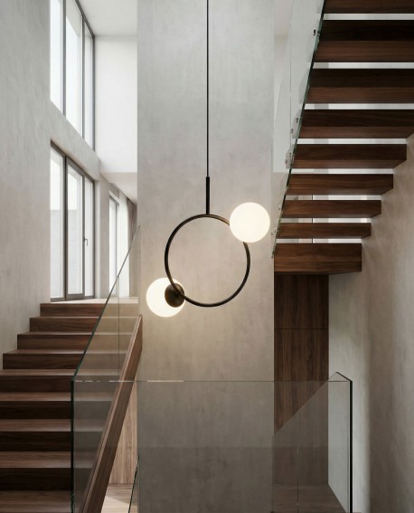  Czarna nowoczesna lampa wisząca z dwoma kulistymi kloszami na okręgu – designerskie oświetlenie sufitowe.