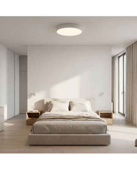 okrągły plafon biały w sypialni nad łóżkiem elegancka lampa sufitowa ORBO D50 do jasnych aranżacji producent Lampit