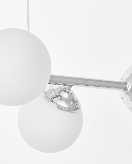 Detal połączenia elementów metalowych i szkła w lampie FINO W6