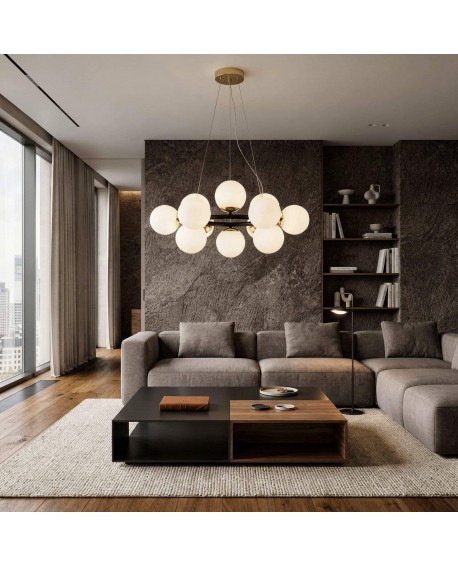 elegancka lampa wisząca czarno złota z kulami w salonie designerskie światło do nowoczesnego wnętrza