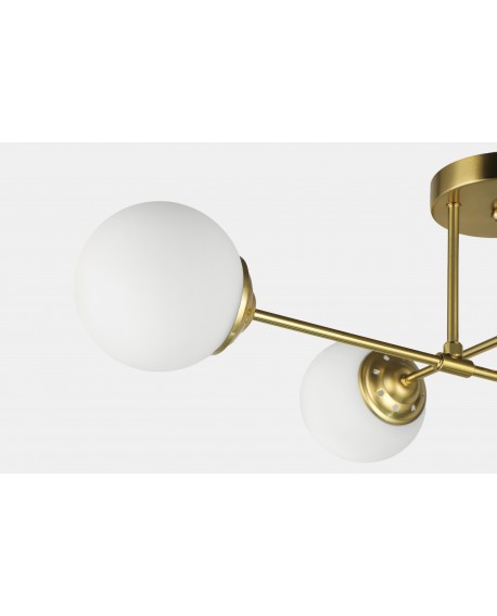 Zbliżenie klosza lampy Fino 4 LED, biała kula na złotym ramieniu – elegancki minimalizm