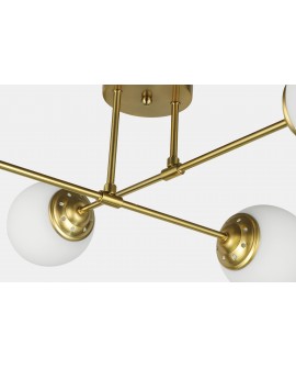Detal mocowania lampy Fino 4 LED, złoto szczotkowane i geometryczna forma oprawy