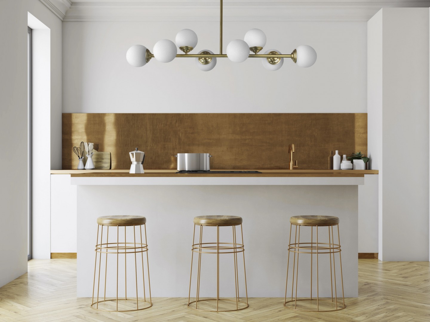 Lampa wisząca FINO W8 ze szczotkowanego złota nad wyspą kuchenną z hokerami