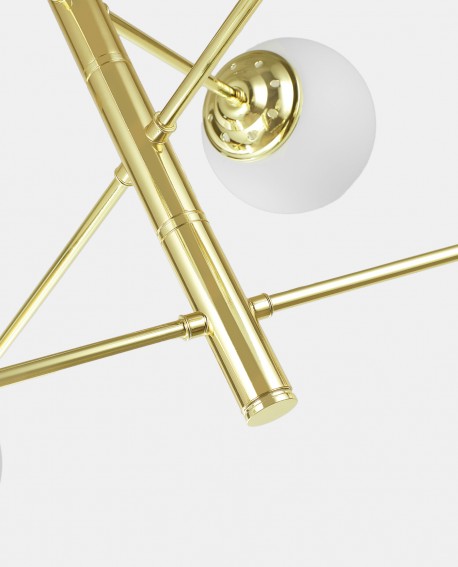 Nowoczesna lampa wisząca z sześcioma mlecznymi kloszami na złotych ramionach, w stylu geometrycznym.