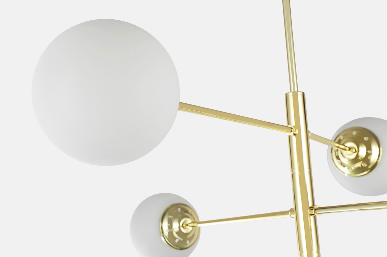 Nowoczesna lampa wisząca z sześcioma mlecznymi kloszami na złotych ramionach, w stylu geometrycznym.
