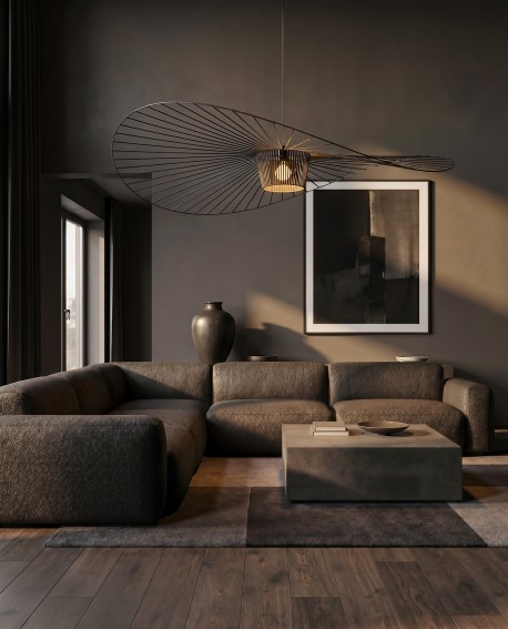 Czarna lampa wisząca SOMBRERO nad narożnikiem w nowoczesnym ciemnym salonie