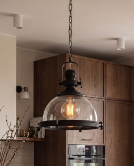 Przezroczysty klosz lampy FALCO firmy Lumina Deco eksponuje dekoracyjną żarówkę